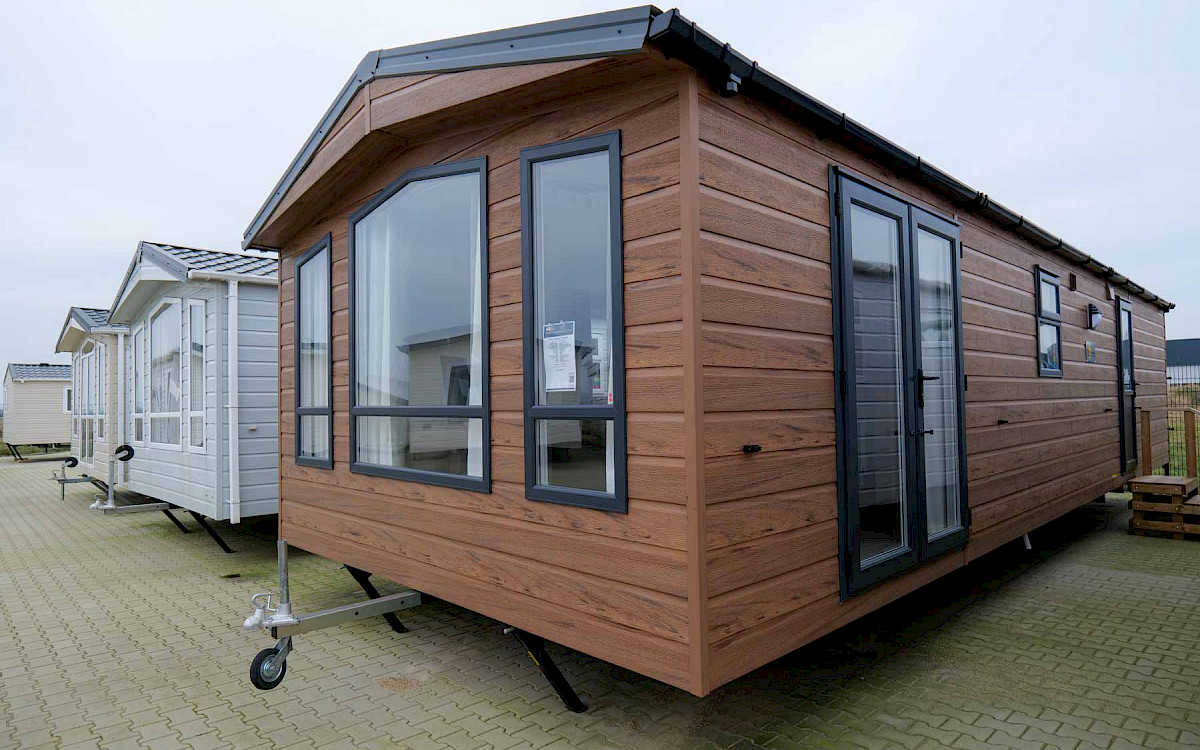 41EE238D-E0E8-4936-B30B-7070ADF60957-1.png Casa móvil woodline 1100/2 (11 x 4 m) - Imagen 1